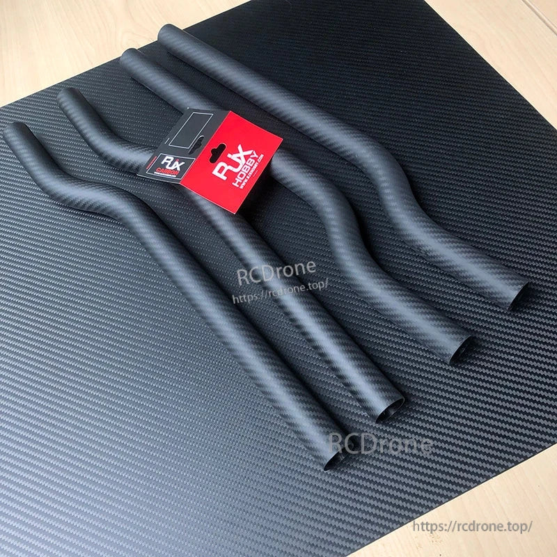 RJX 3K Carbon Fiber Bend Tube, Bent carbon fiber tube with twill weave finish for UAV drone arm builds, displayed with RJX Hobby branding cards.