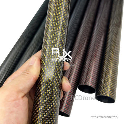 RJX 3K carbon fiber tube with twill weave finish, shown as hollow round tubing in multiple pieces