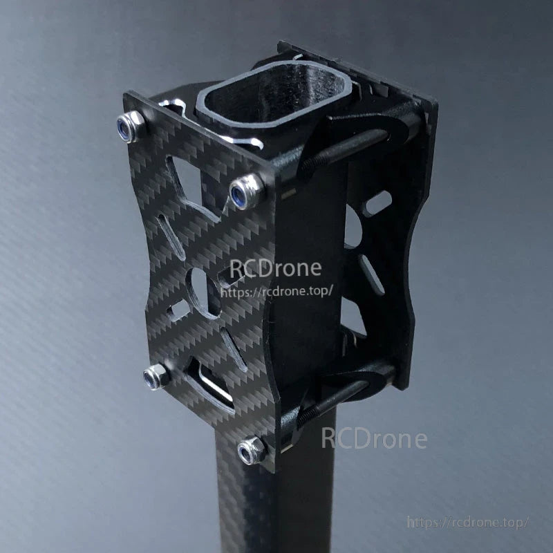 Carbon fiber tube clamp and motor mount bracket with slotted plates, mounted on an octagon tube