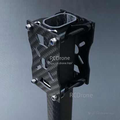 Carbon fiber tube clamp and motor mount bracket with slotted plates, mounted on an octagon tube