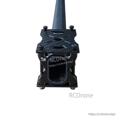 RJX carbon fiber tube clamp with motor mount bracket, top plate and four bolts on an octagon tube
