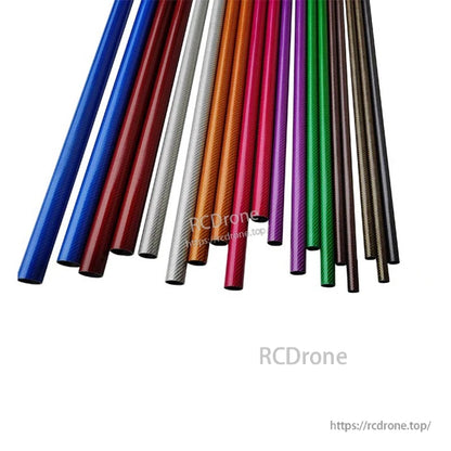 Assorted colorful carbon fiber tubes in blue, red, silver, gold, pink, purple, green, and black finishes