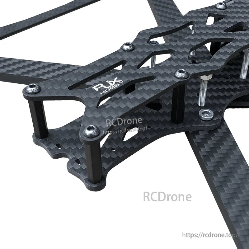 RJX A1 carbon fiber FPV racing drone frame kit center plate with slotted cutouts, standoffs, and screws