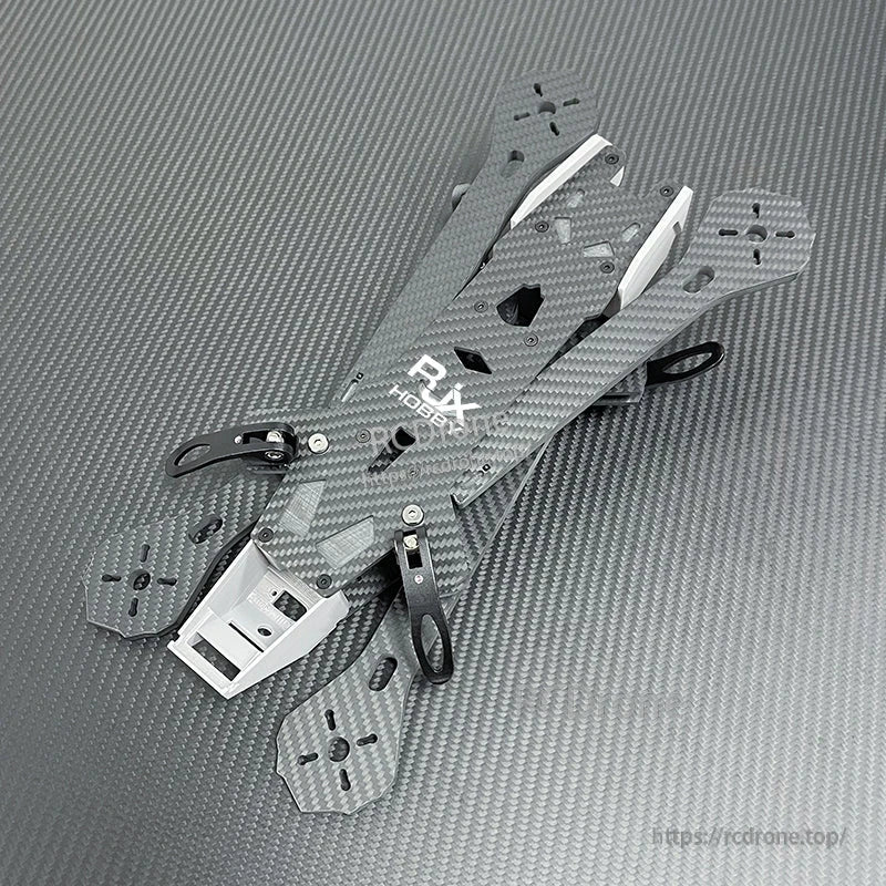 RJX A4 carbon fiber FPV freestyle racing drone frame kit with four arms, top plate, and front mount bracket