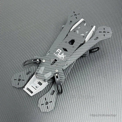 RJX A4 carbon fiber FPV freestyle racing drone frame kit with four arms, top plate, and front mount bracket