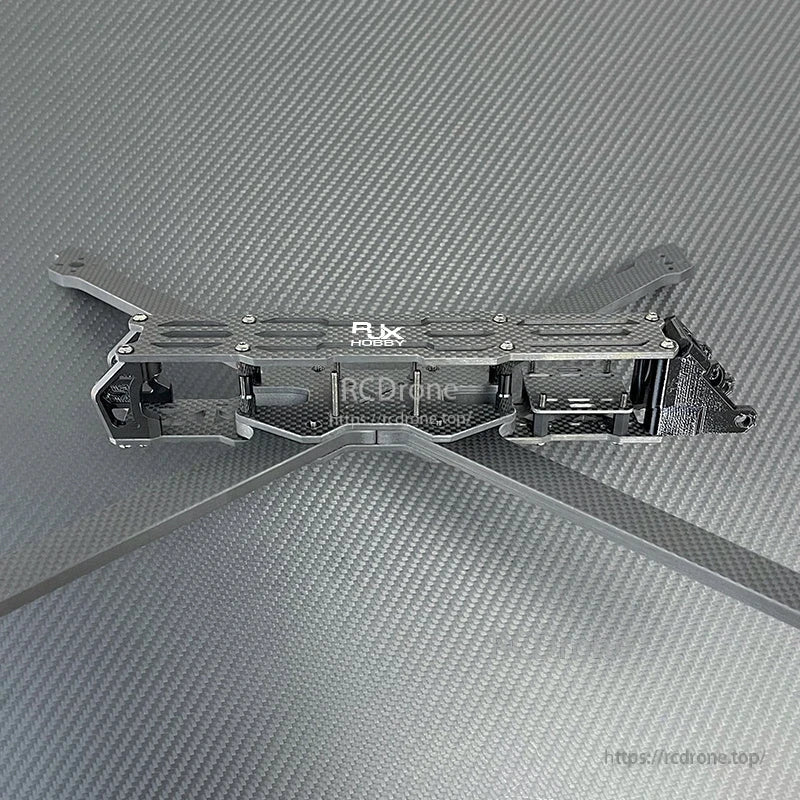 RJX A5 carbon fiber FPV drone frame kit with X-style arms and top plate, black carbon weave finish