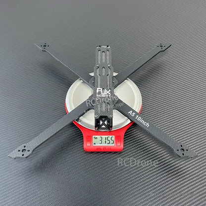 RJX A5 10-inch carbon fiber FPV drone frame in X layout on a digital scale showing 315.5 g