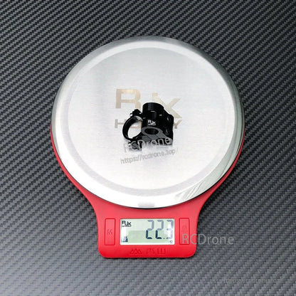 RJX AS150 holder mount clamp in black aluminum on a digital scale reading 22.7 g