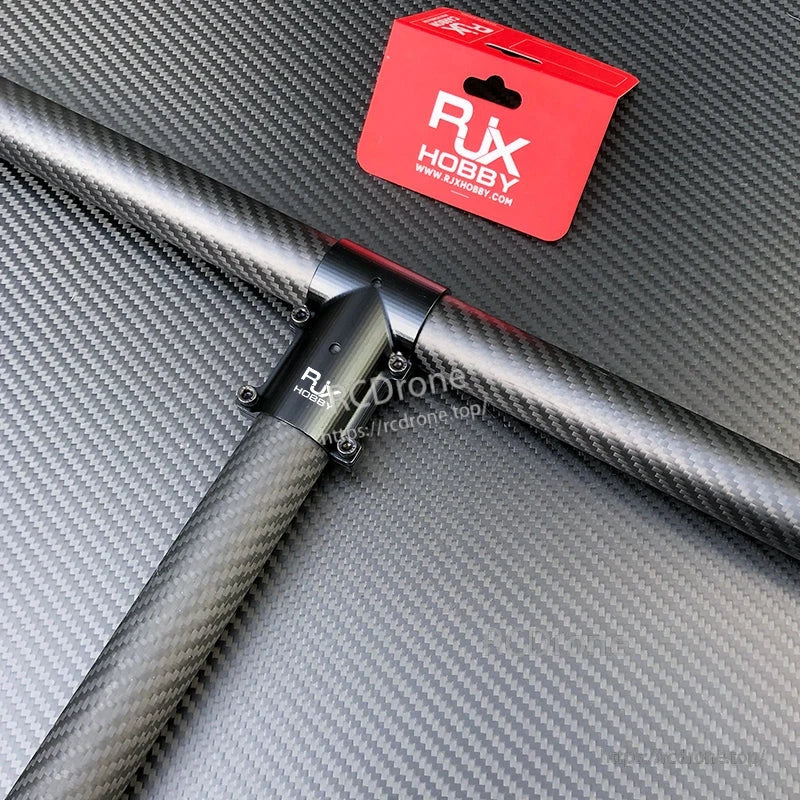 RJX Hobby aluminum tee joint connector clamping two carbon fiber tubes with four screws