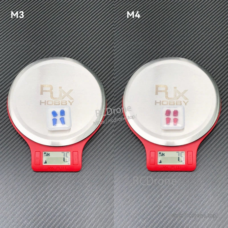 RJX aluminum gimbal thumb stick parts on digital scales, M3 and M4 sets weighing 7.5 g each