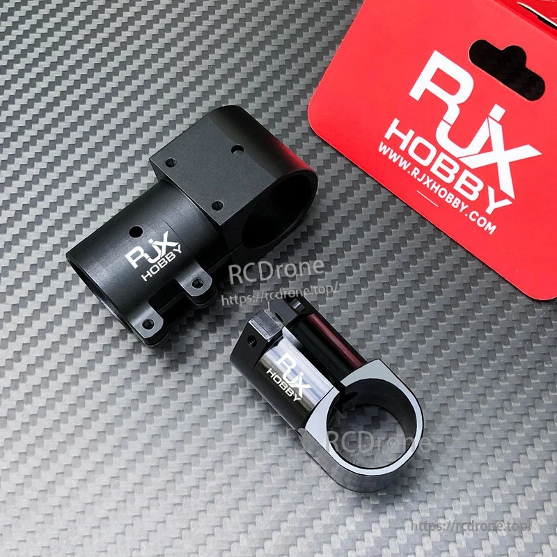 RJX Aluminum Landing Gear Tee Tripod Connector, RJX Hobby aluminum landing gear tee tripod connectors in black finish on carbon fiber surface