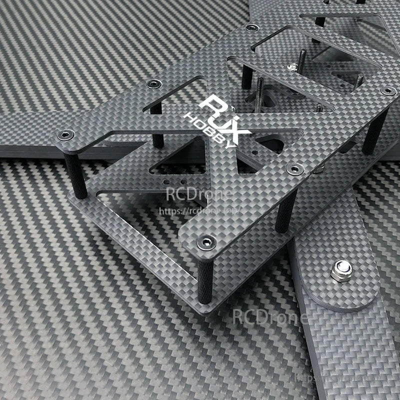 RJX Hobby carbon fiber FPV racing drone frame kit with stacked plates, standoffs, and mounting holes