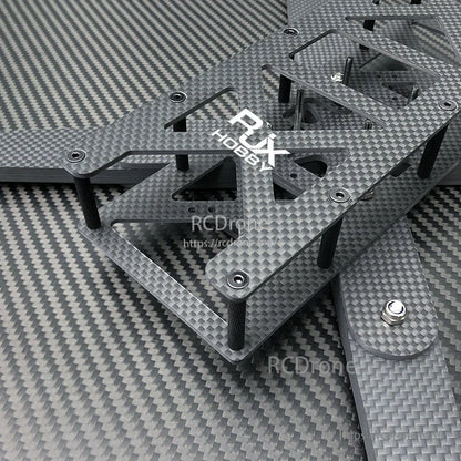 RJX Hobby carbon fiber FPV racing drone frame kit with stacked plates, standoffs, and mounting holes