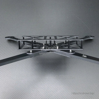 RJX Beam 13-inch carbon fiber FPV drone frame kit with long arms, standoffs, and top plate side view