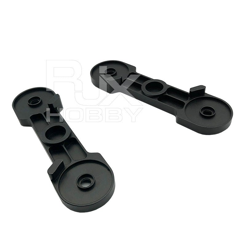 Pair of black RJX CW/CCW propeller clips with circular mounting holes for RC helicopter blades