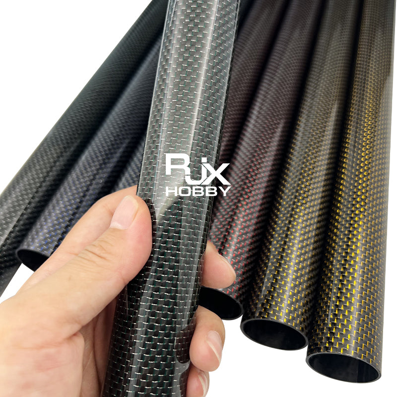 RJX Colored 3K Carbon Fiber Tube, Hand holding RJX 3K carbon fiber tube with woven finish, with multiple colored carbon tubes in the background
