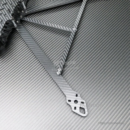 Carbon fiber FPV drone frame arm with mounting holes and metal standoffs installed