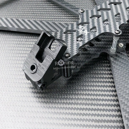 Close-up of RJX DF13 carbon fiber FPV drone frame plate with black TPU mount, standoffs and screws
