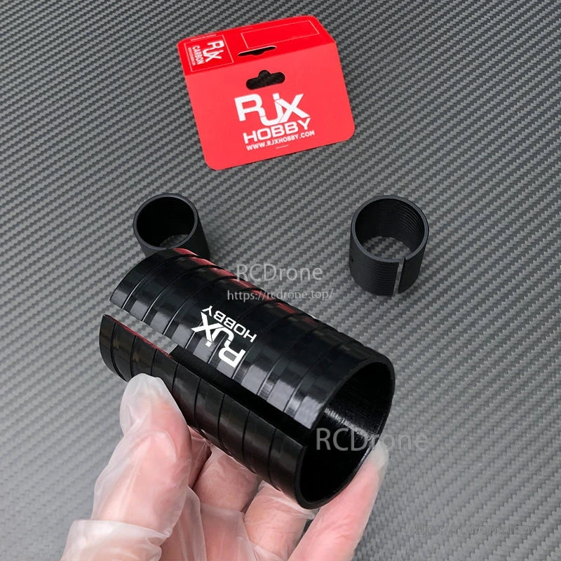 RJX Hobby black split adapter sleeve rings for changing drone arm tube diameter, with RJX package card