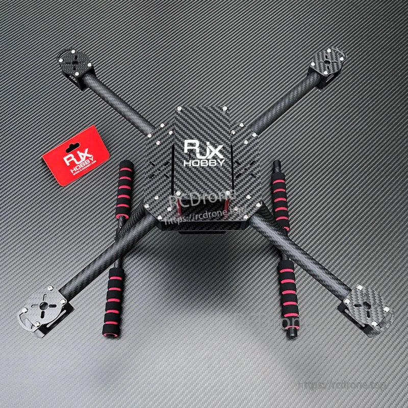RJX F450 Carbon Fiber Frame Kit (RJX Hobby), RJX F450 carbon fiber quadcopter frame kit with four arms, center plates, and landing skids on carbon weave surface