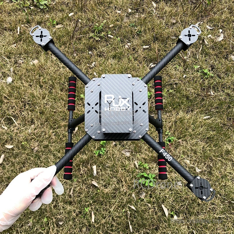RJX F450 Carbon Fiber Frame Kit (RJX Hobby), RJX F450 carbon fiber quadcopter frame kit with four arms, RJX Hobby center plate, and foam landing skids