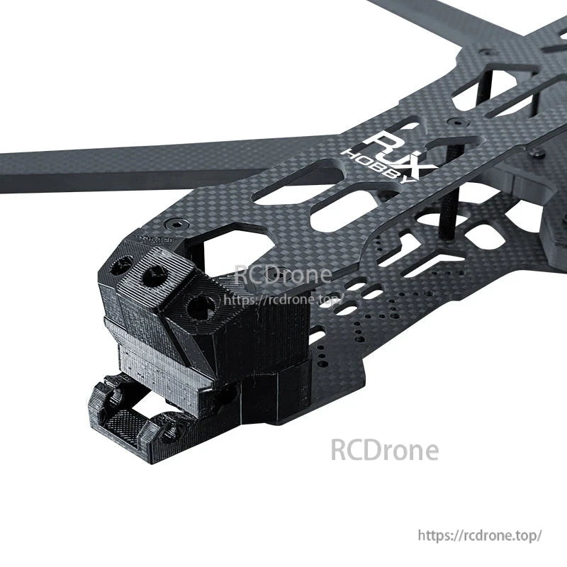Close-up of RJX carbon fiber FPV drone frame front section with RX Hobby logo and 3D-printed TPU camera mount