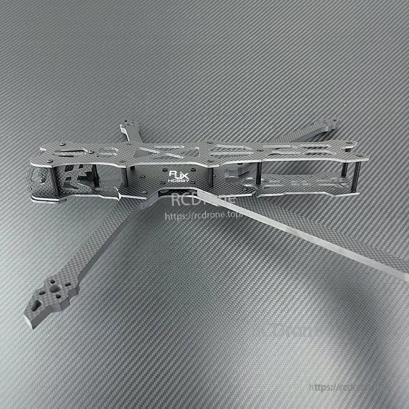 Carbon fiber FPV racing drone frame kit with extended arms, top and bottom plates, and standoff posts