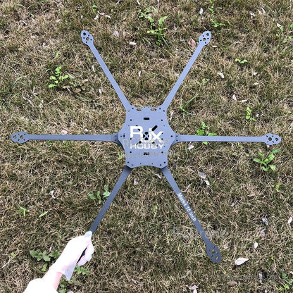 RJX Mark4 15-inch carbon fiber 6-arm FPV drone frame bottom plate with extended arms on grass