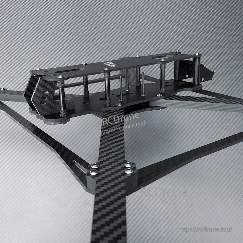 RJX Mark4 V3 Pro carbon fiber FPV racing drone frame kit with long arms, standoffs, and camera mount plates