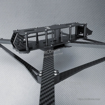 RJX Mark4 V3 Pro carbon fiber FPV racing drone frame kit with long arms, standoffs, and camera mount plates