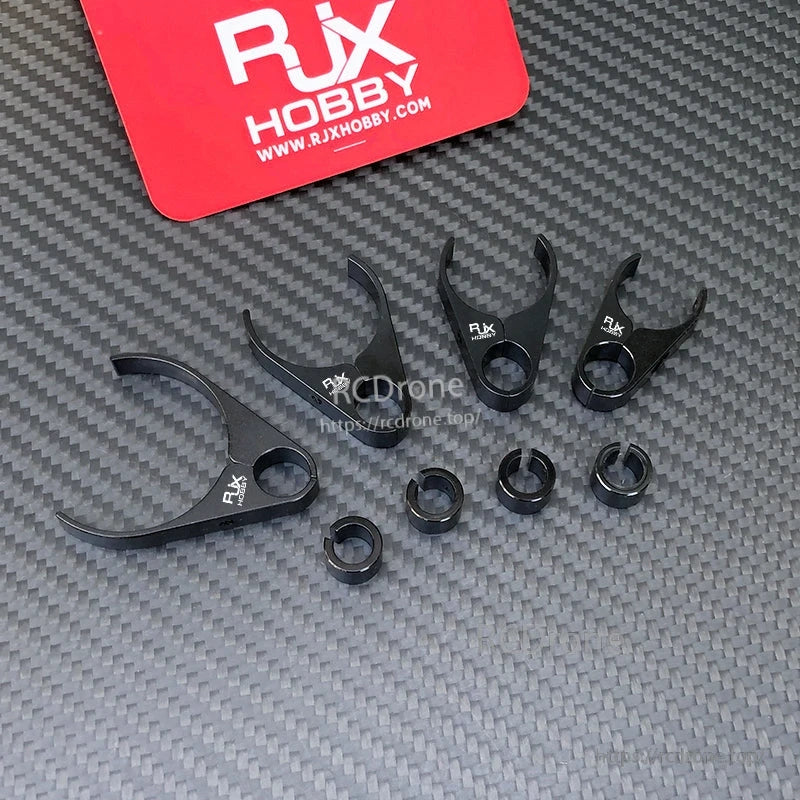RJX plastic water pipe clamp with multiple adapter rings for mounting on carbon fiber tube