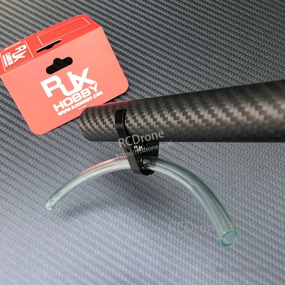 RJX plastic water pipe clamp holding a clear hose to a carbon fiber tube for plant protection drone plumbing