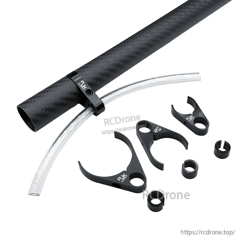 RJX plastic water pipe clamp set holding a clear hose on a carbon fiber tube, with extra clamp pieces