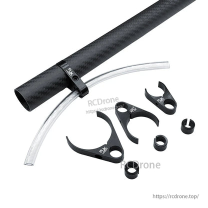 RJX plastic water pipe clamp set holding a clear hose on a carbon fiber tube, with extra clamp pieces