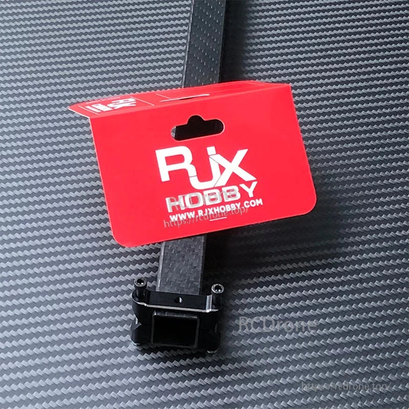 RJX black aluminum square tube clamp mounted on a 20mm square carbon fiber tube with two screw fasteners