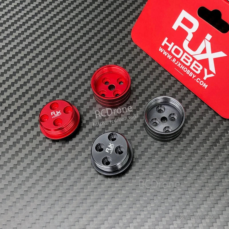 RJX Hobby quick-release propeller mount adapters in red and black anodized aluminum for RC multirotor drones