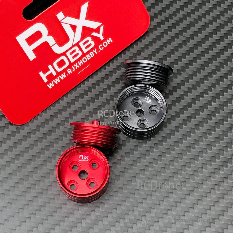 RJX Hobby self-tightening quick release propeller mount adapters in red and black, threaded with multi-hole tops
