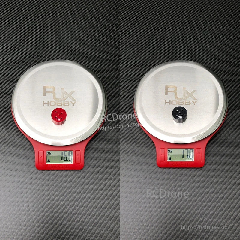 Two RJX Hobby quick release propeller mount adapters on digital scales, each weighing about 17g