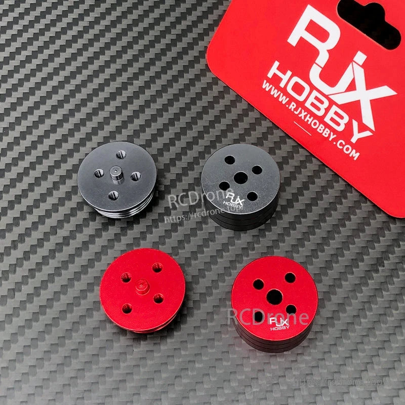 RJX Hobby quick release propeller mount adapters in red and black with multi-hole pattern for RC multirotor drones