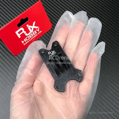 RJX TPU 3D Printed GoPro Mount, RJX Hobby 3D printed TPU GoPro mount plate with four screw holes, held in a gloved hand