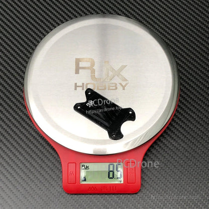 RJX TPU 3D Printed GoPro Mount, RJX TPU 3D printed GoPro-style mount on a digital scale reading 8.5 g