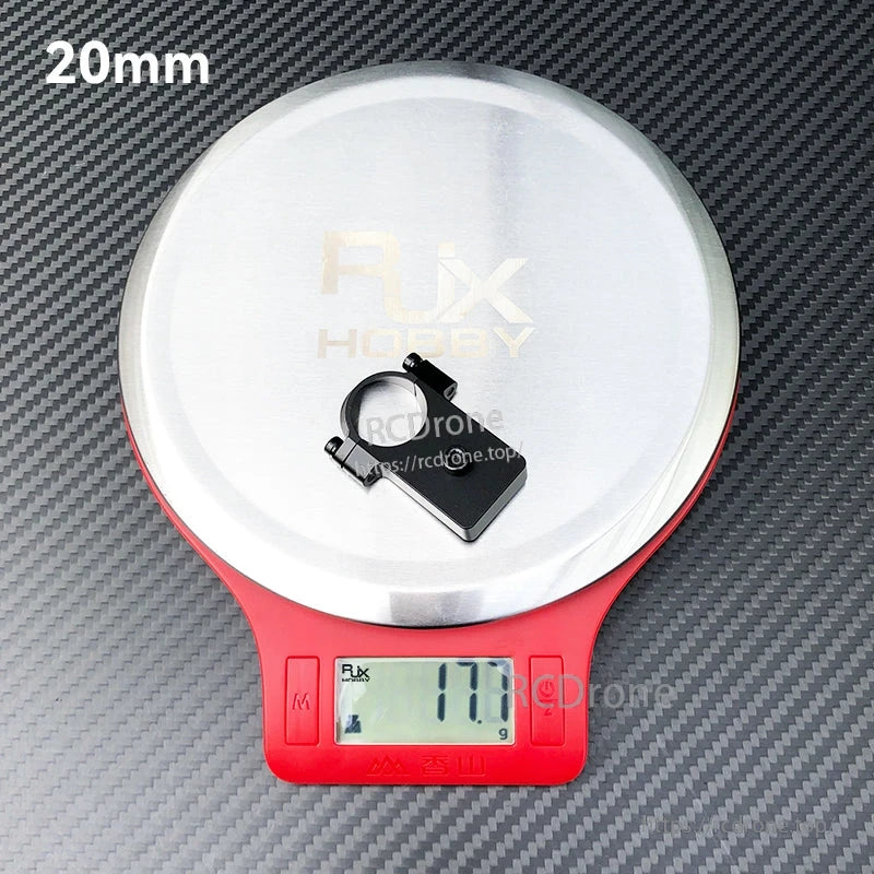 RJX UAV Drone Tube Mount, RJX UAV 20mm drone tube mount clamp on a digital scale, showing 17.7 g weight