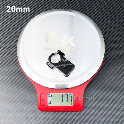 RJX UAV Drone Tube Mount, RJX UAV 20mm drone tube mount clamp on a digital scale, showing 17.7 g weight