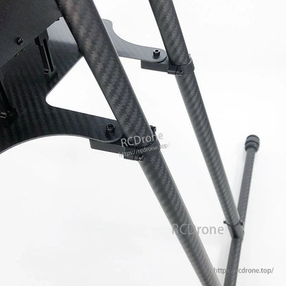 RJX UAV drone tube mount bracket clamped onto carbon fiber landing gear tubes with mounting screws