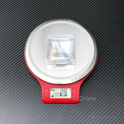 RJX V3 M3L anti-slip gimbal stick in a clear box on a digital scale reading 29 g