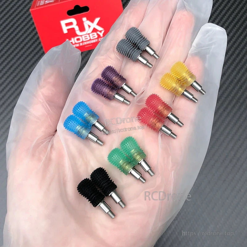 RJX V3 M3L anti-slip gimbal stick accessory in retail packaging on a carbon-fiber style surface