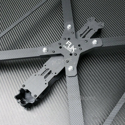 RJX X13 carbon fiber FPV racing drone frame center section with X-style arms, mounting slots, and hardware