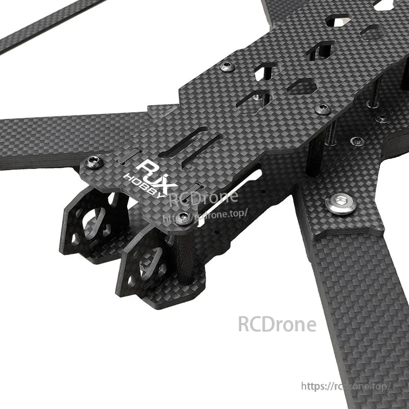 RJX carbon fiber FPV racing drone frame kit close-up with long arms and front camera mounting plates