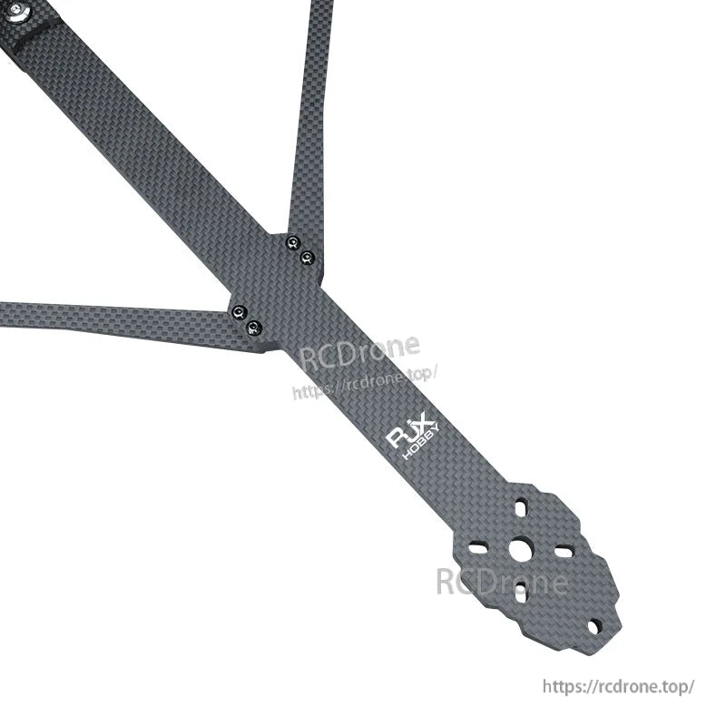 RJX X15 carbon fiber FPV drone frame arm with mounting holes and hardware, showing woven carbon finish