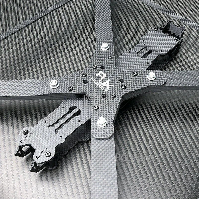 Top view of RJX X15 carbon fiber FPV drone frame kit with X-shaped arms and center plate hardware